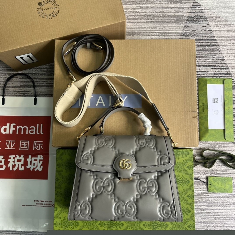 G*u*i top handle bags